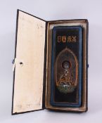 A GOOD CHINESE CARVED INKSTONE DECORATED WITH CALLIGRAPHY AND SCENES OF BUDDHA, poly chrome