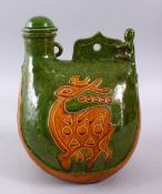 AN UNUSUAL CHINESE BISCUIT AND GREEN GLAZED POTTERY CHILDRENS PORTABLE TOILET, the vessel