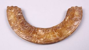 A WESTERN ZHOU STYLE CARVED JADE HUANG PENDANT, 11cm.