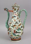 A CHINESE FAMILLE VERTE PORCELAIN EWER, with panel decoration depicting native landscape scenes,
