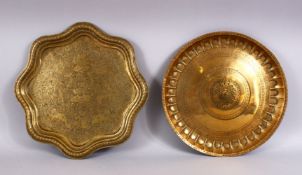 TWO GOOD 18TH / 19TH CENTURY PERSIAN / ISLAMIC BRASS DISHES, one with floral motif and moulded