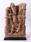 A RARE AND LARGE 11TH / 12TH CENTURY CENTRAL INDIAN CARVED STONE FIGURE OF GANESH WITH HIS WIFE,