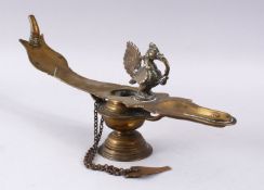 A 18TH / 19TH CENTURY INDIAN BRONZE OIL LAMP, with a bird at spout, 39cm.