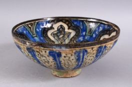 AN INTACT EARLY 14TH CENTURY PERSIAN SULTANABAD POTTERY BOWL, with underglaze blue & turquoise