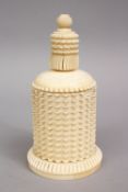 A CARVED INDIAN IVORY CIRCULAR BOX AND COVER, 6ins high.