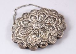 A FINE 19TH CENTURY TURKISH OTTOMAN SILVER MIRROR, with moulded lappet style decoration, 10.5cm high