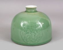 A CHINESE APPLE GREEN INCISED KANGXI STYLE TAI BAI ZUN, with archaic chilong decoration, bae with