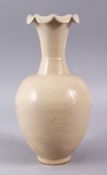 A GOOD CHINESE DING STYLE PORCELAIN FLARED RIM VASE, with a crackle glaze and a chased decoration,