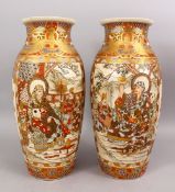 A GOOD PAIR OF JAPANESE MEIJI PERIOD SATSUMA CERAMIC VASES, decorated with two main panels depicting