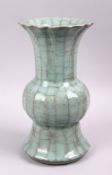 A GOOD CHINESE YUAN STYLE GUAN GLAZE PHOENIX TAIL / GU SHAPE VASE, with amoulded rim, 25cm high,