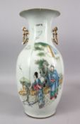 A CHINESE REPUBLIC STYLE FAMILLE ROSE PORCELAIN TWIN HANDLE VASE, decorated with figures in a
