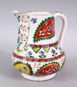 A 19TH CENTURY TURKISH KUTAHYA POTTERY JUG, with floral motif decoration,15cm high.