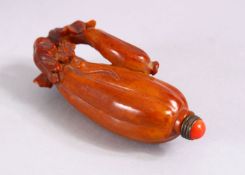 A GOOD CHINESE CARVED & STAINED ANTLER SNUFF BOTTLE IN THE FORM OF AN EGGPLANT, with carved foliage,