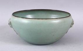 A CHINESE RU WARE POTTERY TWIN HANDLE VASE, with twin moulded lion dog head and ring handles, the