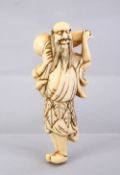 A JAPANESE EDO PERIOD CARVED IVORY NETSUKE OF A SENNIN, stood looking aloft holding a double gourd