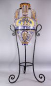 A GOOD ISLAMIC ALHAMBRA POTTERY TWIN HANDLE VASE WITH METAL TRIPOD STAND, the body with yellow