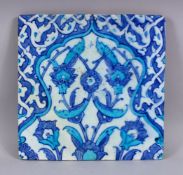 A GOOD TURKISH IZNIK TURQUOISE & BLUE POTTERY TILE SECTION, the tile with finely executed decoration