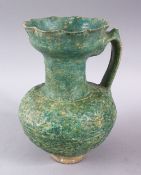 A GOOD 13TH CENTURY KASHAN TURQUOISE GLAZED POTTERY VASE, the vase with a moulded flared rim, carved