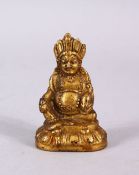 A SMALL JAMBHALA GILT BRONZE FIGURE OF A GODDESS OF WEALTH, on a lotus base, 6cm.