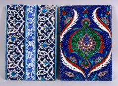 TWO IZNIK POTTERY FRAGMENT TILES, both with floral motif decor, 24cm x 16cm.