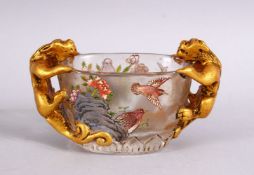 A CHINESE PEKING GLASS TWIN HANDLE LIBATION CUP, with painted decoration of birds and floral display
