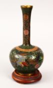 A GOOD JAPANESE MEIJI PERIOD CLOISONNE ENAMEL BOTTLE VASE, the body decorated with wire to depict