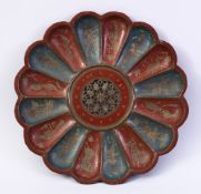 A 19TH CENTURY INDIAN ENAMELLED BRASS DISH, of lobed design, with pierced and engraved centre,