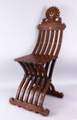 A GOOD 19TH CENTURY CARVED WOODEN ISLAMIC FOLDING CHAIR, inlaid with mother of pearl, 113cm high.