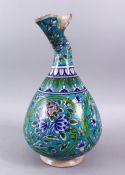 A GOOD 19TH CENTURY PERSIAN TURQUOISE AND BLUE POTTERY VASE, with a open spill neck, and floral