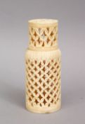 A GOOD 19TH CENTURY CHINESE CARVED IVORY OPENWORK CRICKET CAGE, 9.6cm high x 4cm.
