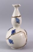 A GOOD CHINESE MING STYLE CARVED LEAF PORCELAIN VASE, with carved leaf decoration and a fluted