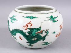 A CHINESE FAMILLE VERTE PORCELAIN DRAGON BRUSH WASH, with dragons amongst clouds, 16.5cm dia.