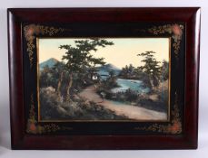 A GOOD CHINESE EMBELLISHED PICTURE OF A LANDSCAPE, with a gilt decorated border, and a hardwood