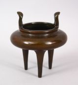 A GOOD CHINESE LONG FOOT BRONZE TWIN HANDLE CENSER, the base with a impressed four character mark,