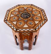 A 19TH CENTURY MOORISH EXOTIC WOOD INLAID AND MOTHER OF PEARL OCTAGONAL TABLE, inlaid with mother of