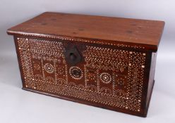 A GOOD 19TH CENTURY OR EARLIER INDO PORTUGUESE MOTHER OF PEARL INLAID TRUNK, 36cm high x 69cm wide.