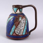 A 19TH CENTURY ISLAMIC BRASS & ENAMEL CALLIGRAPHIC EWER, with panels of enamel decoration with