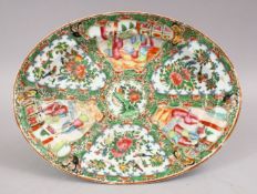 A 19TH CENTURY CHINESE CANTON FAMILLE ROSE PORCELAIN DISH, with panel decoration of figures exterior