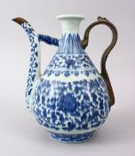 A GOOD EARLY POSSIBLY MING DYNASTY BLUE & WHITE PORCELAIN EWER FOR THE ISLAMIC MARKER, the body