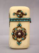 A FINE QUALITY INDIAN CARVED IVORY INLAID TURQUOISE, PEARL & RUBY CASE, the vase with metal mounts