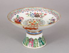 A GOOD CHINESE FAMILLE ROSE PORCELAIN STEM CUP, decorated with bajixing pattern, the underside
