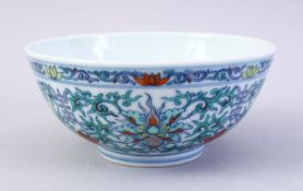 A GOOD CHINESE DOUCAI DECORATED PORCELAIN BOWL, the body decorated with scenes of formal scrolling