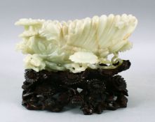 A VERY FINE 19TH CENTURY CHINESE CARVED CELADON JADE CHRYSANTHEMUM FORM BRUSH WASH AND CARVED STAND,