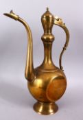 A LARGE 19TH CENTURY IRANIAN BRASS EWER, 40cm x 27