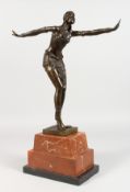 AN ART DECO STYLE BRONZE FIGURE OF A DANCER, on a rectangular marble base. 19ins high.