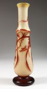A SLENDER GALLE GLASS VASE, with grape and vine decoration. 10ins high.