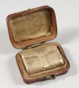 A GEORGE III SILVER GILT BAG SHAPED VINAIGRETTE. Birmingham 1792. Maker: John Shaw. In a leather