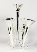A SILVER PLATED EPERGNE. with five trumpet shaped vases. 18ins high.
