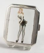 AN ENGINE TURNED SILVER CIGARETTE CASE, with an oval of a glamour model in a black lace dress.