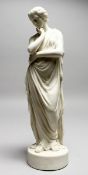 A 19TH CENTURY PARIAN CLASSICAL FEMALE FIGURE, on a circular base. 14ins high.